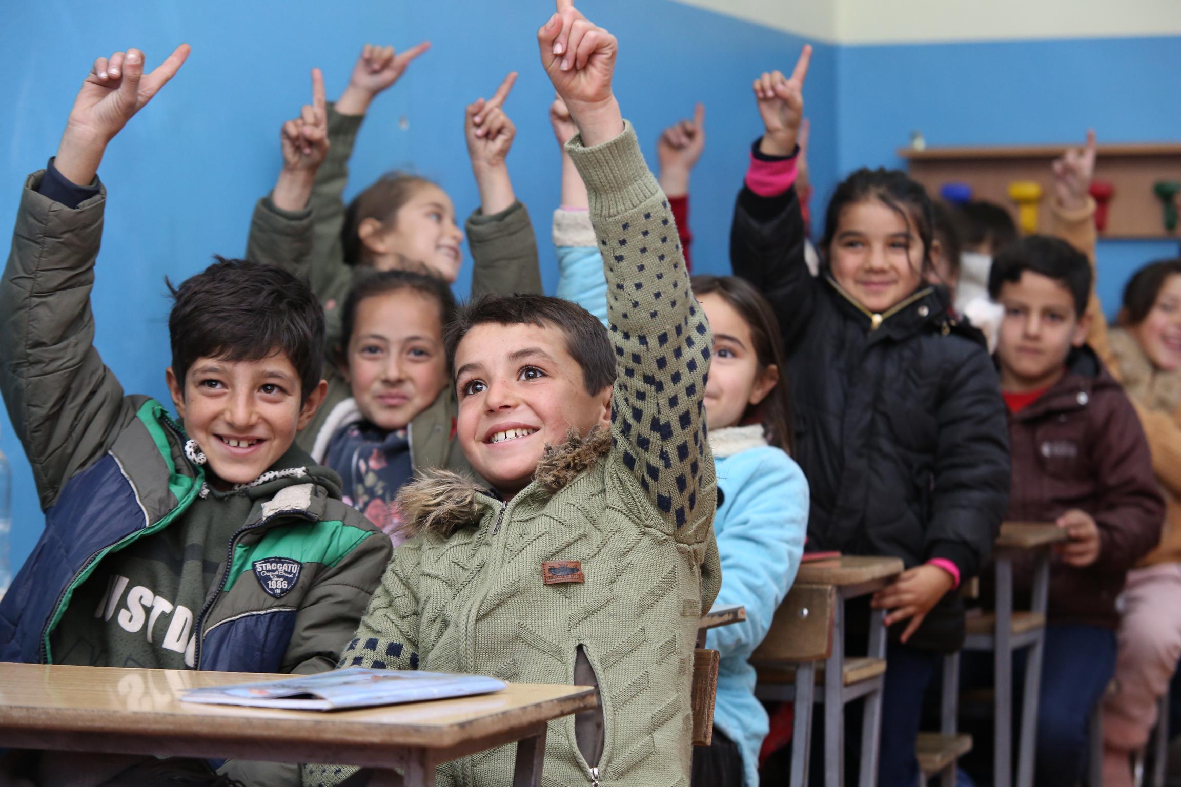 Students actively engaging and participating in the classroom